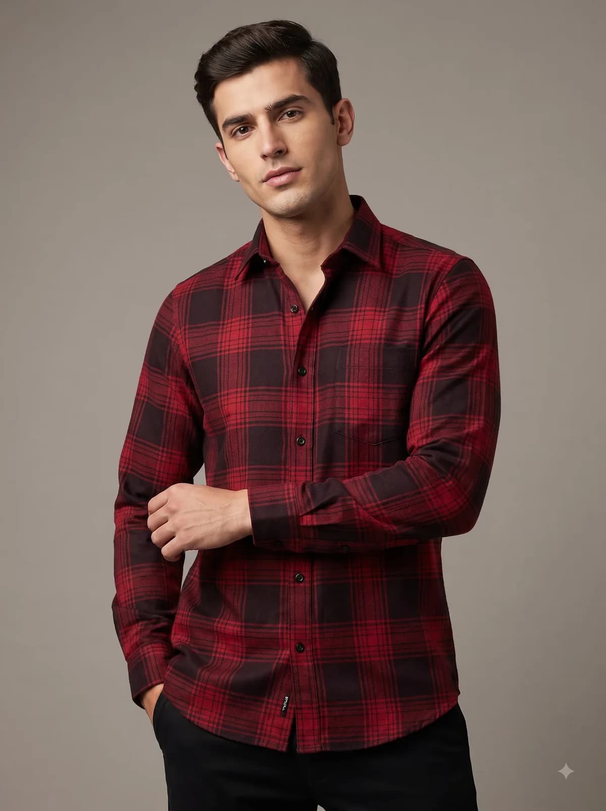 Model in a crimson and black tartan full-sleeve shirt