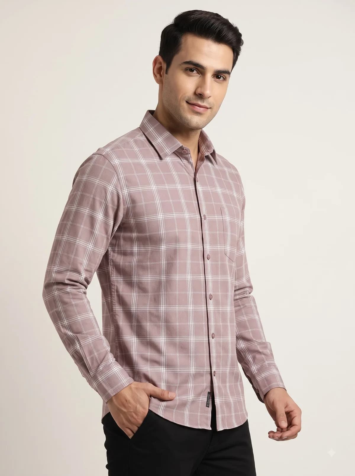 Model in a dusty rose windowpane check full-sleeve shirt with a chest pocket