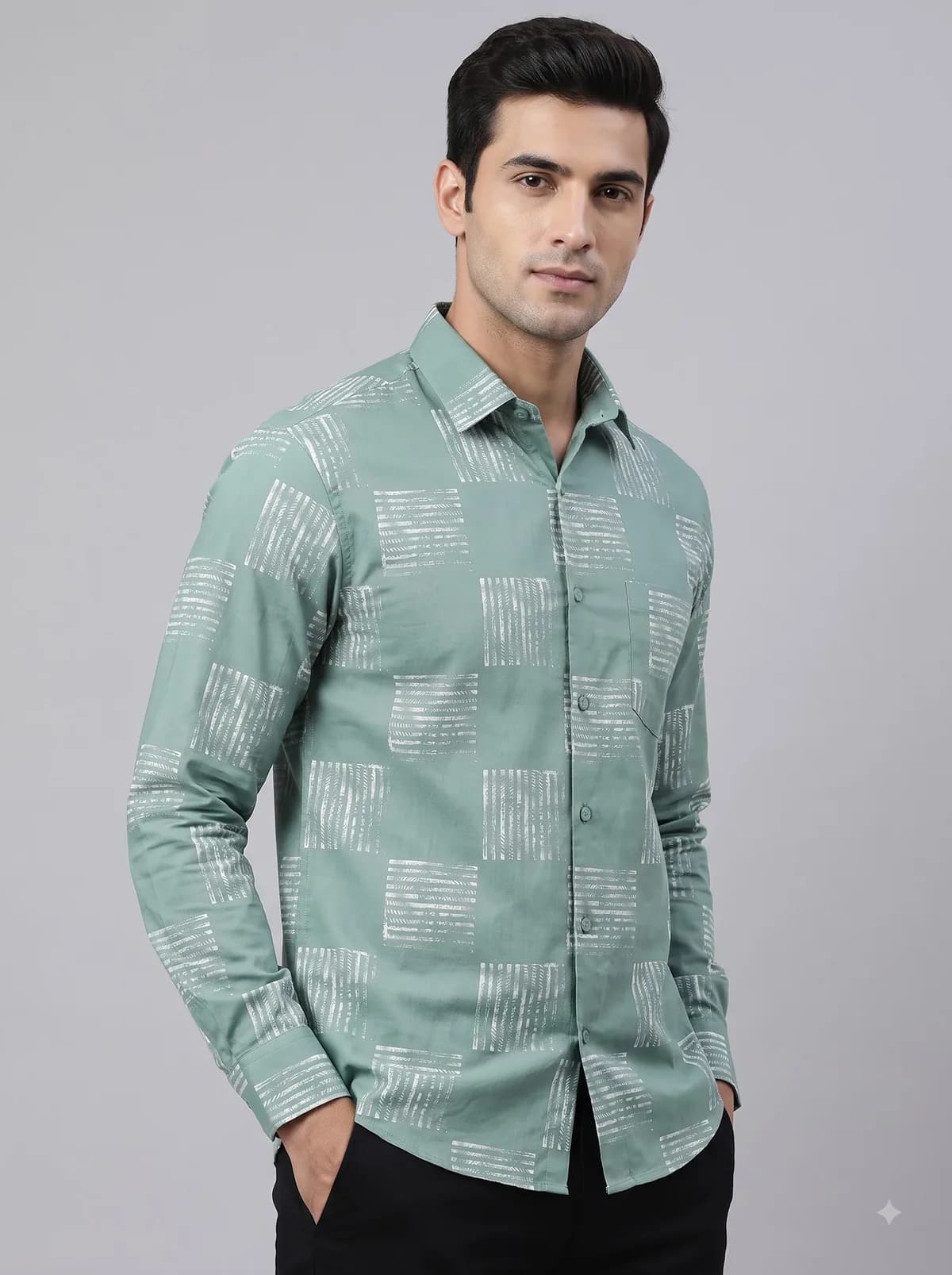 Model in a sage full-sleeve shirt with a white hatched square print