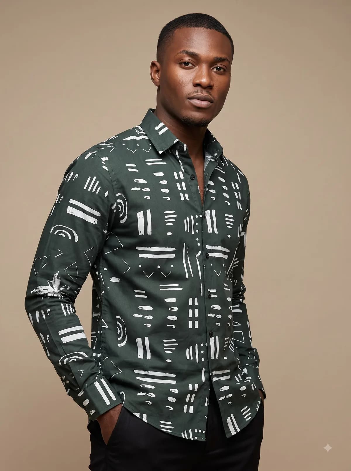 Model in a forest green full-sleeve shirt with white mudcloth brush print